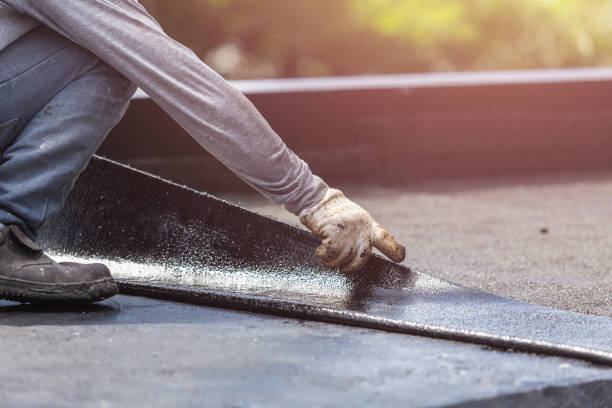 Professional Basement Waterproofing technician working in Walkersville, MD